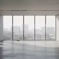 Ein minimalistisches, leeres Bürogebäude mit modernen architektonischen Linien und natürlichem Lichteinfall. - Foto: über boerse-global.de