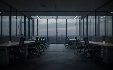 Ein leeres, modern eingerichtetes Bürogebäude in der Dämmerung, das die Atmosphäre von beruflicher Belastung und Stille einfängt. - Foto: über boerse-global.de
