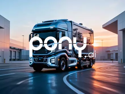 Futuristischer autonomer LKW in einem modernen Logistikzentrum bei Sonnenaufgang. - Foto: über boerse-global.de