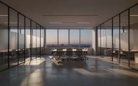 Ein minimalistisch gestalteter, moderner Büroraum mit klaren Linien und natürlichem Lichteinfall in einer ruhigen Atmosphäre. - Foto: über boerse-global.de