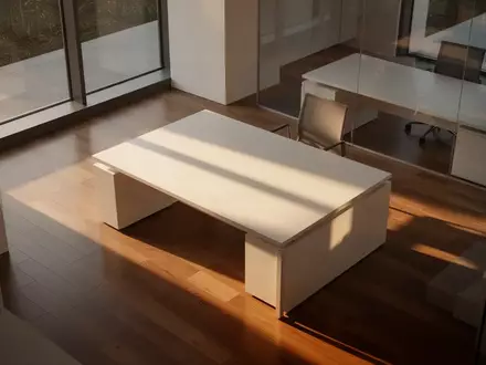 Ein minimalistisch gestalteter, leerer Büroraum mit architektonischen Schatten und natürlichem Lichteinfall. - Foto: über boerse-global.de