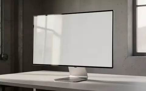 Ein minimalistischer, heller Arbeitsplatz mit einem leeren Monitor in einem ruhigen, natürlich beleuchteten Raum. - Foto: über boerse-global.de