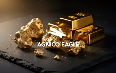Glänzende Goldbarren und Goldnuggets auf einem dunklen, strukturierten Untergrund in stimmungsvoller Beleuchtung. - Foto: über boerse-global.de