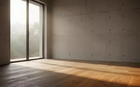 Ein minimalistischer, lichtdurchfluteter Raum mit sanften Schatten, der eine Atmosphäre der Ruhe und Reflexion ausstrahlt. - Foto: über boerse-global.de