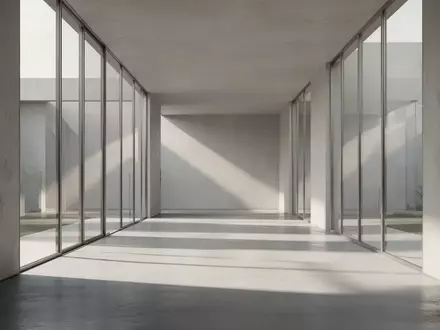 Modernes, minimalistisches Architektur-Interieur mit klaren Linien und weichem Tageslicht in einem leeren Korridor. - Foto: über boerse-global.de