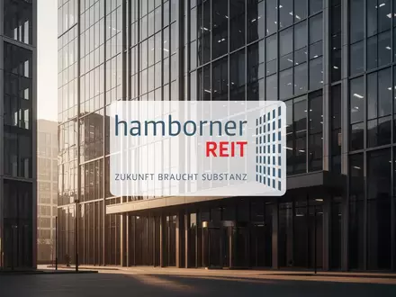 Moderne Büroarchitektur mit Glasfassade im weichen Morgenlicht als Symbol für Immobilieninvestitionen. - Foto: über boerse-global.de