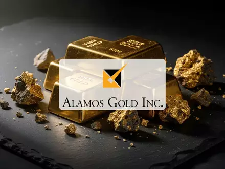 Goldbarren und Golderz auf einer dunklen Oberfläche als Symbol für den Edelmetallmarkt. - Foto: über boerse-global.de