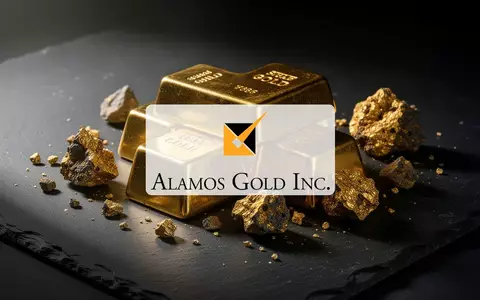Goldbarren und Golderz auf einer dunklen Oberfläche als Symbol für den Edelmetallmarkt. - Foto: über boerse-global.de