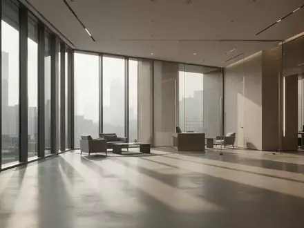 Ein minimalistischer, sonnendurchfluteter Büroraum mit klaren Linien und Schattenwurf, der eine ruhige Arbeitsumgebung symbolisiert. - Foto: über boerse-global.de
