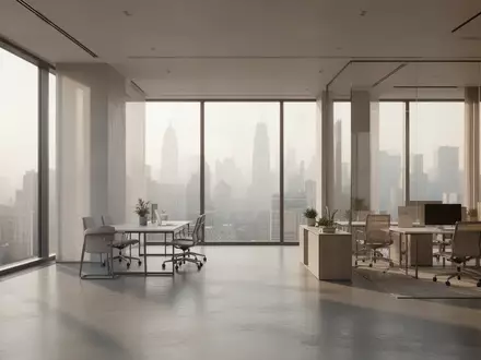 Ein minimalistisches, modernes Großraumbüro mit großen Fenstern und Blick auf eine Skyline bei Tageslicht. - Foto: über boerse-global.de