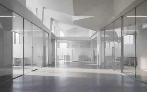 Ein minimalistisches, modernes Forschungsgebäude mit klaren architektonischen Linien und hellem, natürlichem Tageslicht. - Foto: über boerse-global.de