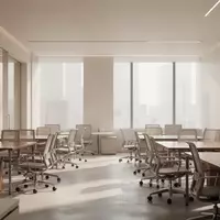 Ein minimalistisch gestalteter, heller Büroraum mit leeren Arbeitsplätzen und natürlichem Lichteinfall. - Foto: über boerse-global.de