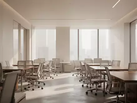 Ein minimalistisch gestalteter, heller Büroraum mit leeren Arbeitsplätzen und natürlichem Lichteinfall. - Foto: über boerse-global.de