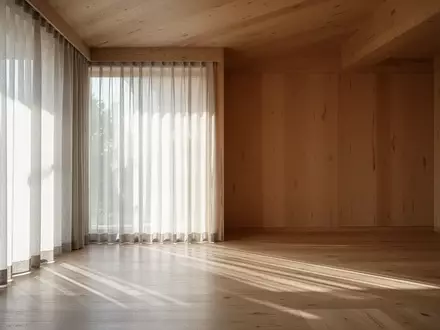 Ein minimalistischer, lichtdurchfluteter Raum mit sanften architektonischen Linien und einer ruhigen, einladenden Atmosphäre. - Foto: über boerse-global.de