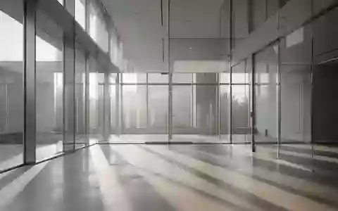 Minimalistische moderne Architektur mit hellem Tageslicht und klaren Linien in einem leeren Raum. - Foto: über boerse-global.de