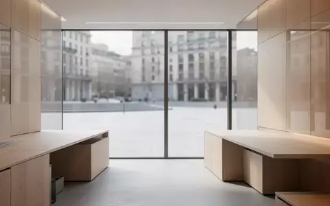 Ein minimalistisch gestaltetes, leeres Büro mit klaren Linien und hellem Tageslicht, das eine ruhige, professionelle Umgebung symbolisiert. - Foto: über boerse-global.de