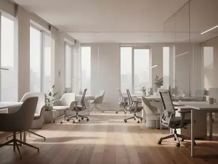 Ein minimalistisch gestalteter, lichtdurchfluteter Arbeitsbereich mit hellem HolzfuĂboden und neutraler Einrichtung. - Foto: ĂŒber boerse-global.de
