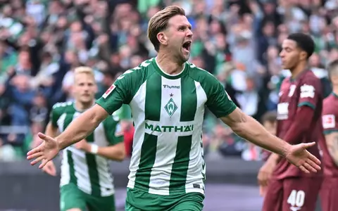 Niclas Füllkrug jubelt über sein Tor gegen Augsburg. - Foto: David Inderlied/dpa