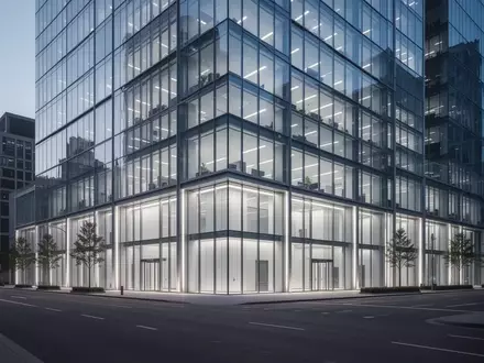 Ein modernes Bürogebäude in einem Finanzviertel bei Dämmerung, aufgenommen von einer ruhigen Straße aus. - Foto: über boerse-global.de