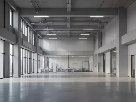Ein minimalistisch gestaltetes, modernes Forschungsgebäude mit hohen Decken und polierten Betonböden in einer hellen, ruhigen Umgebung. - Foto: über boerse-global.de