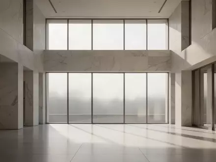 Ein minimalistisch gestalteter, leerer Flur in einem Regierungsgebäude mit hellem Marmor und natürlichem Lichteinfall. - Foto: über boerse-global.de