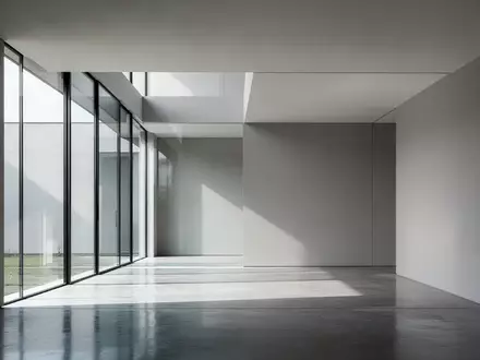 Ein minimalistischer, moderner Innenraum mit klaren Linien und hellem, natürlichem Licht. - Foto: über boerse-global.de