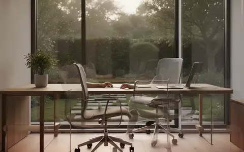 Ein minimalistisch eingerichteter, ruhiger Arbeitsplatz in einem hellen Raum mit Blick in einen Garten. - Foto: über boerse-global.de