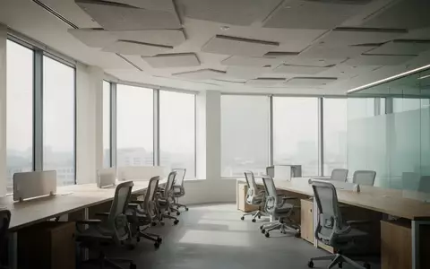 Ein minimalistisch gestalteter, heller Büroraum mit ergonomischen Stühlen und großen Fenstern in einer ruhigen Arbeitsumgebung. - Foto: über boerse-global.de