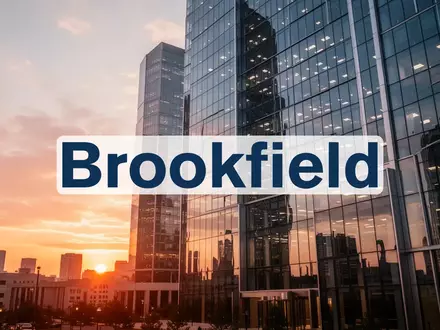 Moderner Bürokomplex mit Glasfassade bei Sonnenaufgang als Symbol für Finanzwachstum und institutionelle Stabilität - Foto: über boerse-global.de