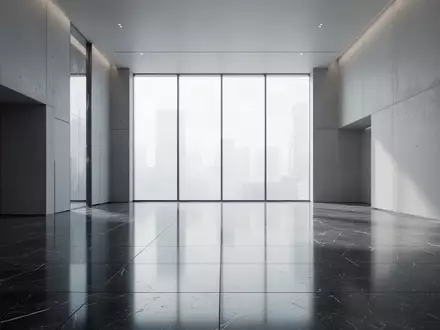 Ein minimalistischer, leerer Innenraum eines modernen Finanzgebäudes mit poliertem Steinboden und natürlichem Lichteinfall. - Foto: über boerse-global.de