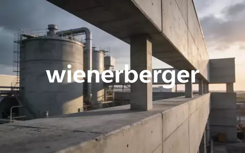 Moderne industrielle Baustoffanlage in einer architektonisch anspruchsvollen Umgebung bei Tageslicht. - Foto: über boerse-global.de