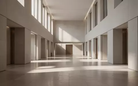 Ein minimalistisches, modernes Behördengebäude mit klaren Linien, hellem Tageslicht und leeren Fluren. - Foto: über boerse-global.de