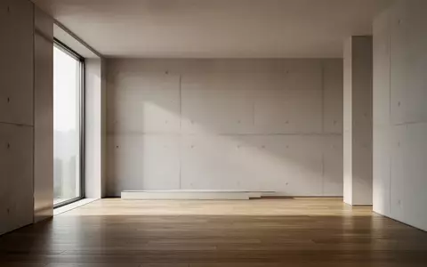 Ein minimalistischer, moderner Innenraum mit klaren architektonischen Linien und natĂĽrlichem Lichteinfall. - Foto: ĂĽber boerse-global.de
