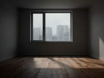 Ein leerer, minimalistischer Wohnraum bei gedämpftem Tageslicht, der eine melancholische und ruhige Atmosphäre ausstrahlt. - Foto: über boerse-global.de