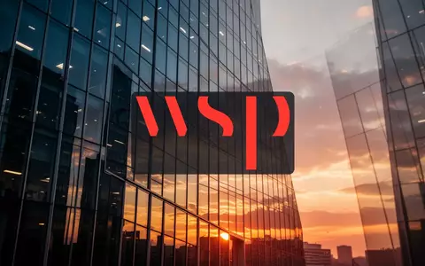 Moderne Glasfassade eines Bürogebäudes bei Sonnenuntergang als Symbol für die Ingenieurs- und Beratungsbranche - Foto: über boerse-global.de