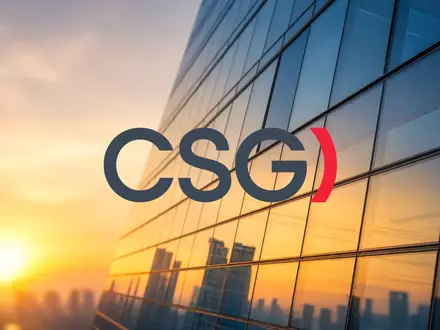 Abstrakte Darstellung eines modernen Bürogebäudes bei Sonnenaufgang als Symbol für positive Marktstimmung. - Foto: über boerse-global.de