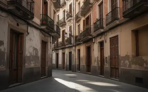 Eine ruhige, historische Wohnstraße im Madrider Stadtteil Retiro mit alten Wohngebäuden und traditionellen Balkonen. - Foto: über boerse-global.de