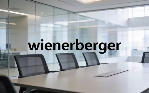Modernes, lichtdurchflutetes Bürogebäude mit minimalistischer Architektur, das strategisches Management symbolisiert. - Foto: über boerse-global.de