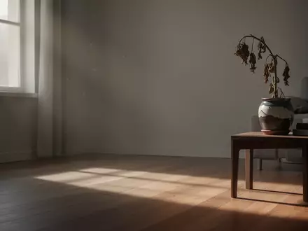 Ein minimalistischer, ruhiger Raum mit gedämpftem Licht, der die Erschöpfung und die Notwendigkeit von Regeneration symbolisiert. - Foto: über boerse-global.de