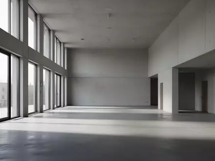 Leeres, minimalistisches Treppenhaus in einem modernen Verwaltungsgebäude mit kühler Lichtstimmung. - Foto: über boerse-global.de