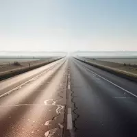 Eine leere, mehrspurige Autobahn, die sich in der Morgensonne durch eine weite, offene Landschaft erstreckt. - Foto: über boerse-global.de
