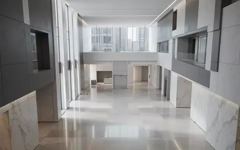 Ein minimalistisches, modernes Bankgebäude mit klaren architektonischen Linien und hellem, natürlichem Lichteinfall. - Foto: über boerse-global.de