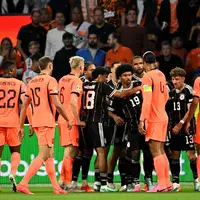 Die deutschen Spieler bejubelten ihr Führungstor, die Holländer beschwerten sich. - Foto: Federico Gambarini/dpa