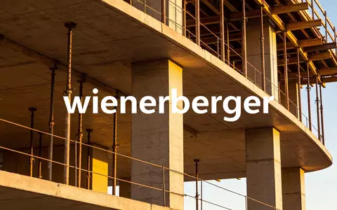 Abstrakte Darstellung einer modernen Baustelle bei Sonnenuntergang als Symbol für die Bauindustrie. - Foto: über boerse-global.de