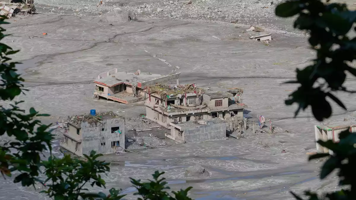 Zerstörter Häuser nach der Sturzflut in Nepal. (Archivbild)  - Bild: Dar Yasin/AP/dpa