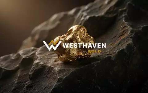 Ein glänzender Goldnugget auf einer dunklen, geologischen Gesteinsoberfläche als Symbol für den Goldbergbau. - Foto: über boerse-global.de