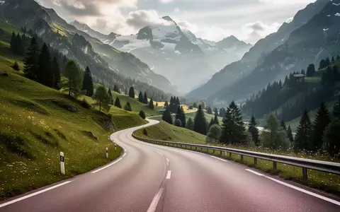 Eine kurvenreiche BergstraĂźe in den Schweizer Alpen bei natĂĽrlichem Tageslicht. - Foto: ĂĽber boerse-global.de
