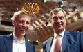 Haben Grund zur Freude: Münchens Oberbürgermeister Dominik Krause (l) und Bayerns Ministerpräsident Markus Söder - Foto: Marijan Murat/dpa