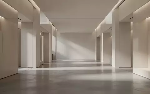 Ein minimalistischer, moderner Verkaufsraum mit klaren architektonischen Linien und neutralem Licht. - Foto: über boerse-global.de