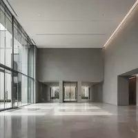 Ein minimalistischer, moderner Innenraum eines Regierungsgebäudes mit hellen Steinböden und großen Glasfronten. - Foto: über boerse-global.de